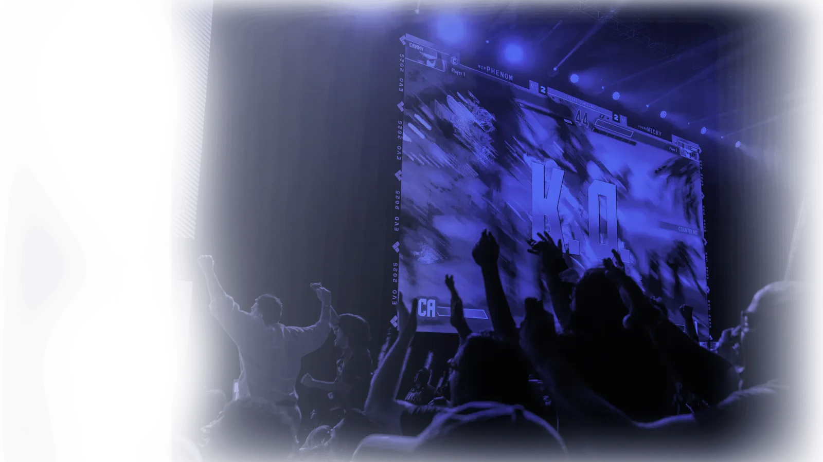 Official Evo event-page image of a fighting-game crowd cheering at a large screen